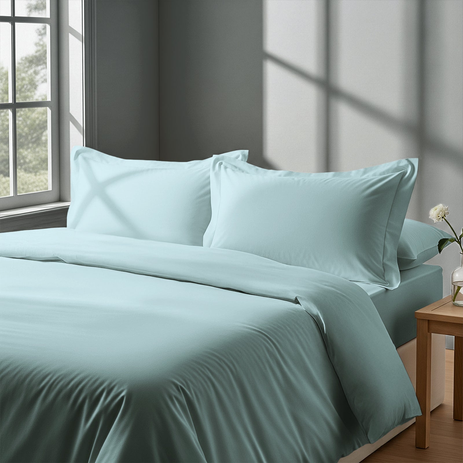 Calm luxurious bedroom bed with Baby blue Pizuna Linens cotton duvet cover super king size